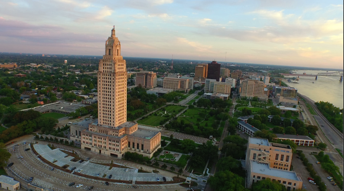 0016 aerial drone arc around Louisiana State Capitol with baton rouge skyline