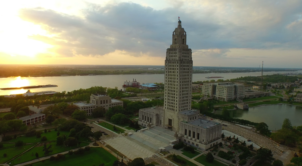 0017 dolly around Louisiana state capital with baton rouge downtown skyline in background