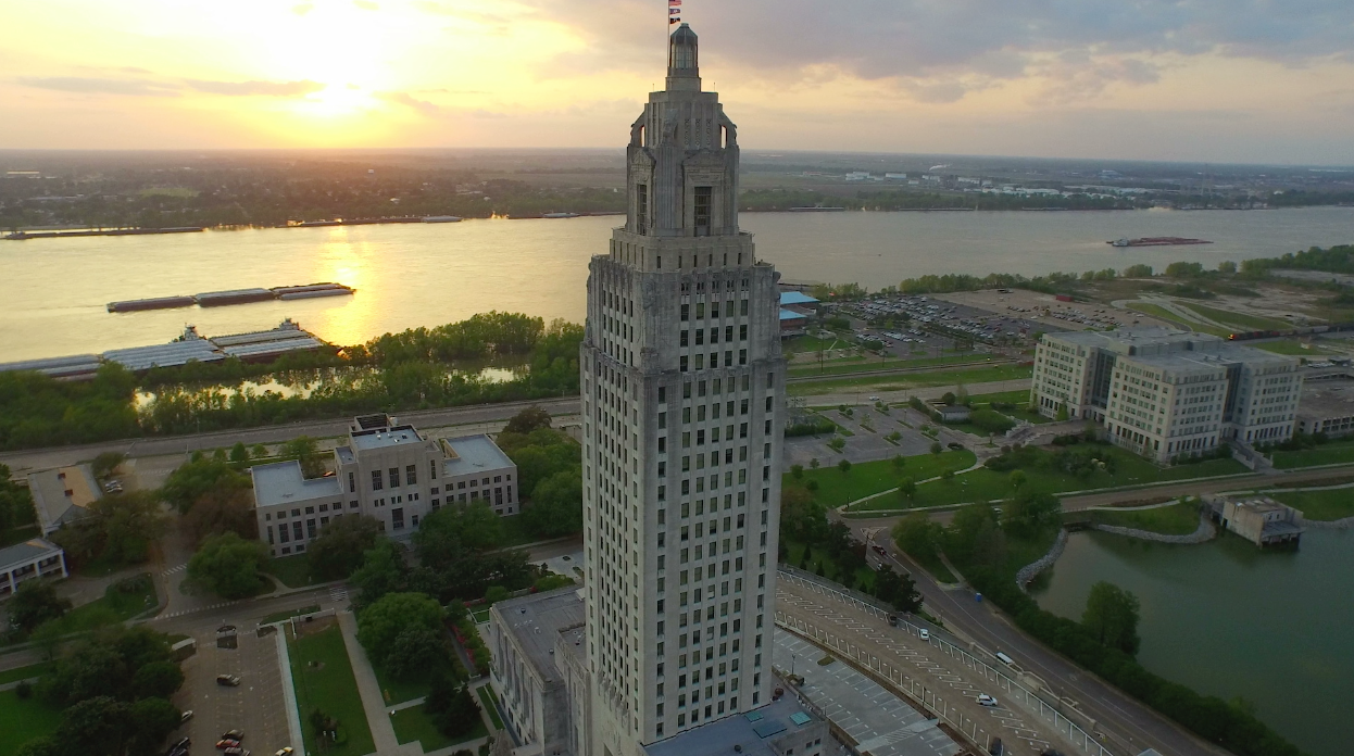 0011 Louisiana State Capitol during sunset drone aerial arc right