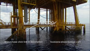 0439 tilt up legs of oil rig gas platform near Texas Louisiana coast