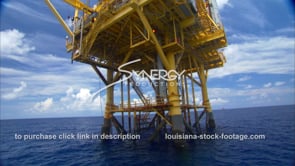 0435 Oil rig gas platform legs in gulf of Mexico arc around platform legs