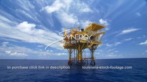 0433 Epic oil rig gas platform offshore in Gulf of Mexico blue sky