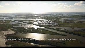 0540 Epic view of Louisiana coastal erosion and pipelines criss crossing wetlands