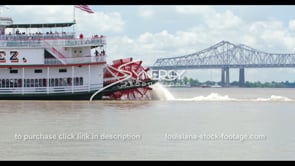 1118 Natchez riverboat paddle wheel churning water