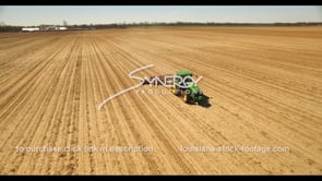 0690 farmer on tractor forming flat rows aerial