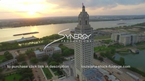 0008 Epic aerial drone arc out of Louisiana State Capitol 1 to nice sunset on Mississippi river