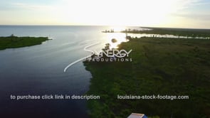 0035 lake ponchatrain fishing camp aerial drone fly over at sunset near new orleans louisiana