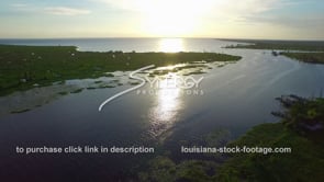 0056 scenic drone aerial of lake pontchartrain area at sunset