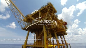 0465 working offshore oil rig gas platform low angle