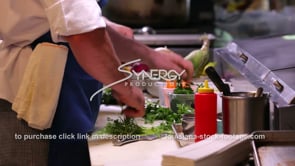 0365 chefs cutting parsley food prep in Louisiana seafood restaurant