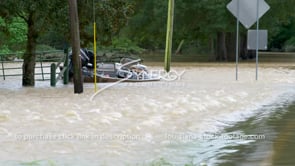 0347 tilt to sunken boat in raging flood waters after torrential rain