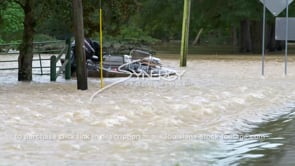 0315 tilt to capsized boat in flood waters heavy rain storm hurricane tropical storm