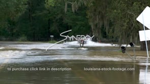 0319 people escaping in a boat raging flood water from flooding river