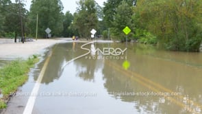 0320 WS couple walking through flood water pan