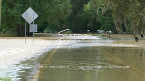 0332 overflowing river flood water flooding roadway