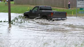 0341 truck plowing thru deep flood water from storm flooding