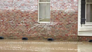 0343 CU Flood water line mark on flooded house after flood crest