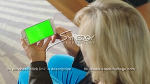 1868 woman swipes right on iphone smartphone green screen