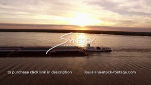 1972 barge on Mississippi River sunset aerial