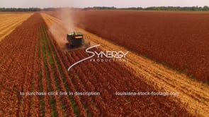 2190 John Deere combine tractor harvesting corn aerial